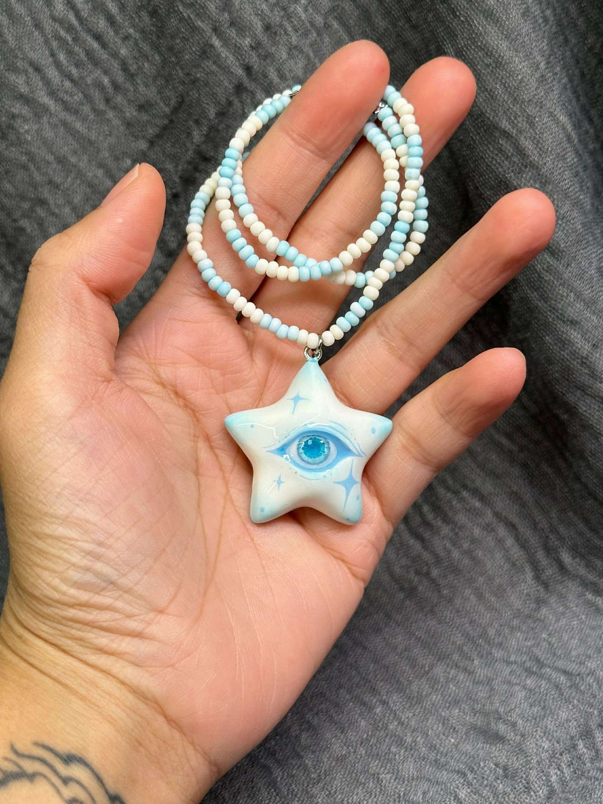 Ice Blue Star Eye Necklace
