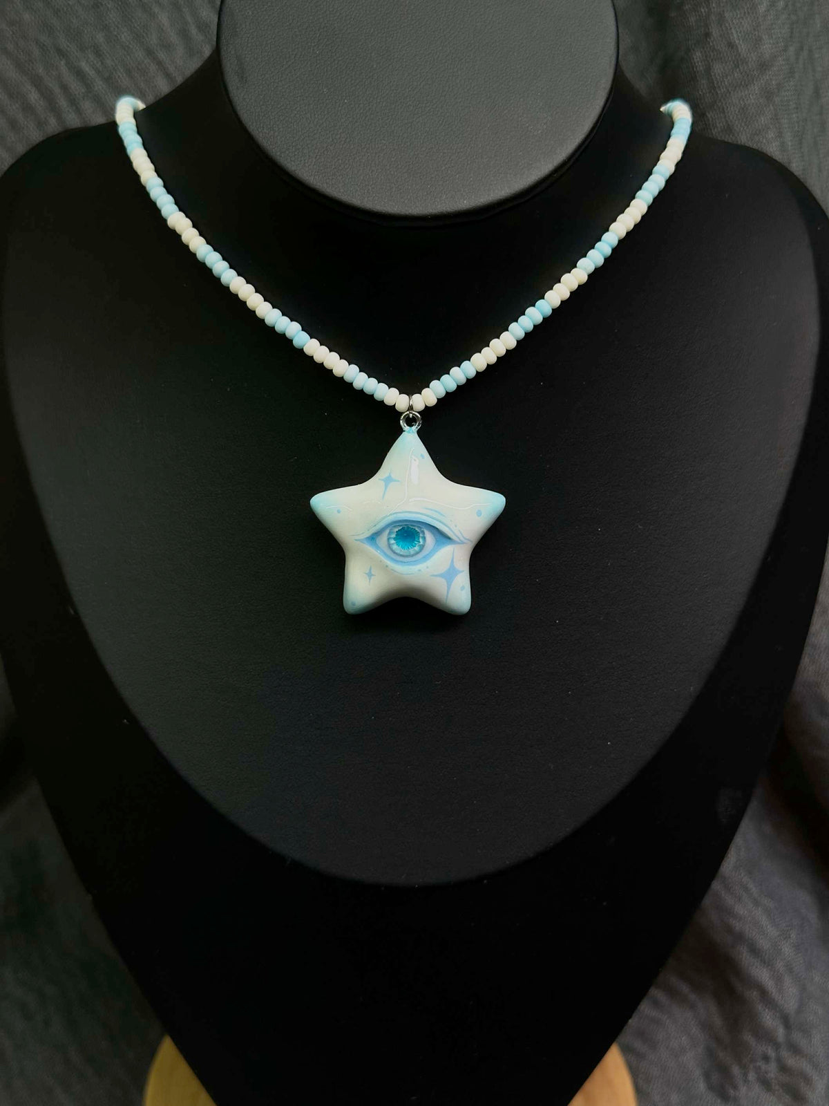 Ice Blue Star Eye Necklace